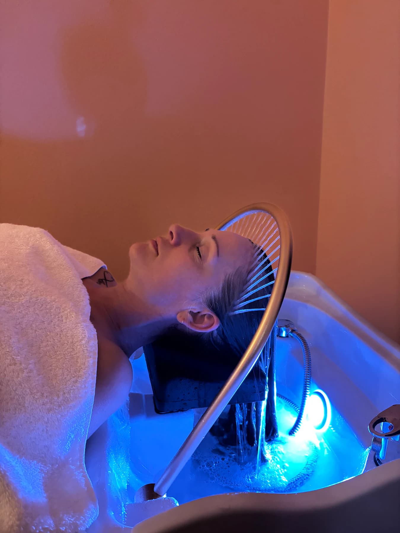 Hot stone massage preparation serene spa interior Zen spa editorial photo 5